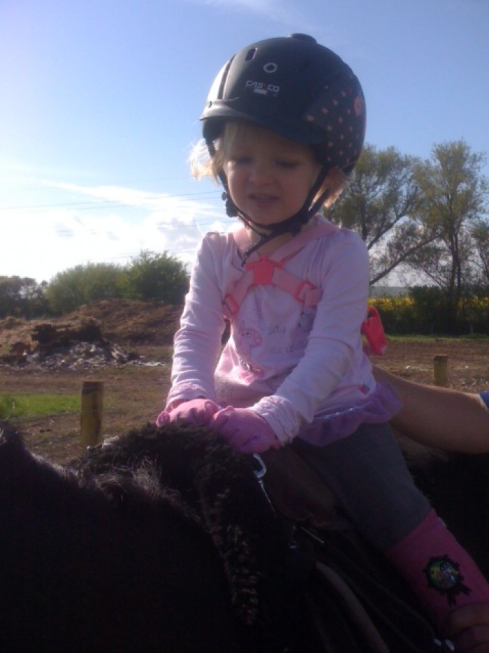 Little Lily having a lovely ride at Honeywood